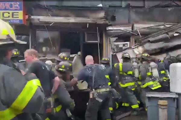 A group of firefighters at the scene immediately rushed in to help free them from the wreckage.