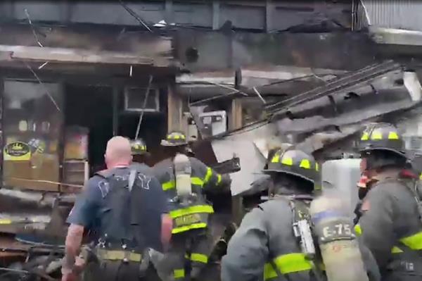 The signs crushed at least five firefighters in Washington Heights.