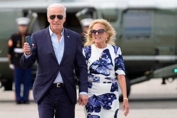 President Joe Biden, left, and first lady Jill Biden arrive on Marine One at East Hampton Airport, Saturday, June 29, 2024, in East Hampton, N.Y