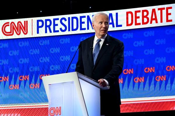 US President Joe Biden looks on as he participates in the first presidential debate of the 2024 elections with former US President and Republican presidential candidate Do<em></em>nald Trump