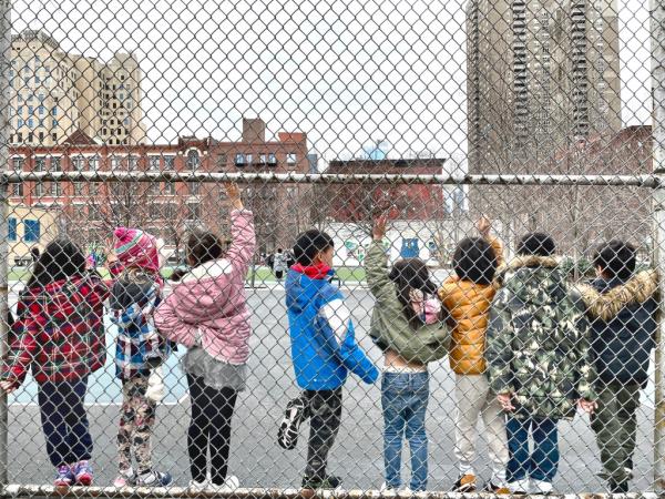 A photo of public school kids during recess at PS 111 in Hell's Kitchen.