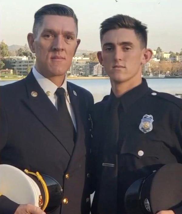 A portrait of Laffan and his father, Assistant Fire Chief Sean Laffan, in their uniform. The father died from a heart attack while on duty in 2020..