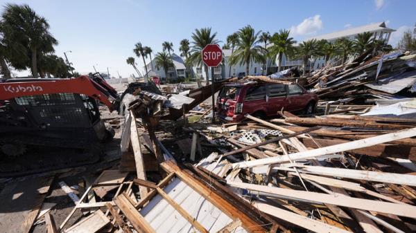 Rescuers race to free people trapped by Hurricane Helene as storm kills 35